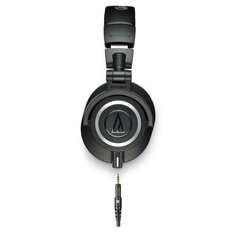 Black over-ear headphones, headband and cable plug with gold connector