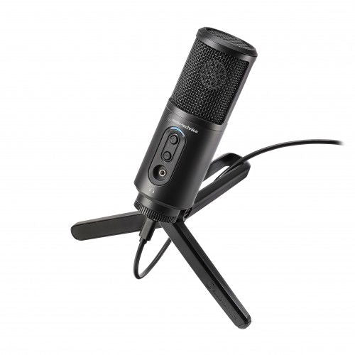 USB microphone with mesh grille, built-in controls, and tripod stand included