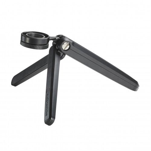 USB microphone on fold-out tripod legs with adjustable base knob