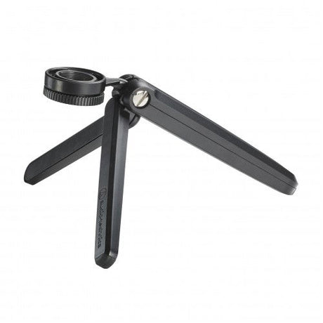USB microphone on fold-out tripod legs with adjustable base knob