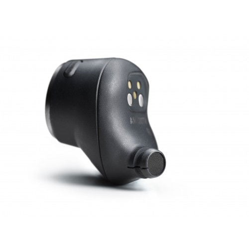 Black wireless earbud side view with small button and speaker grille visible