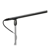 Professional shotgun microphone with mount, black body and grille on a stand