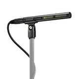 Shotgun microphone with shock mount and cable, angled view