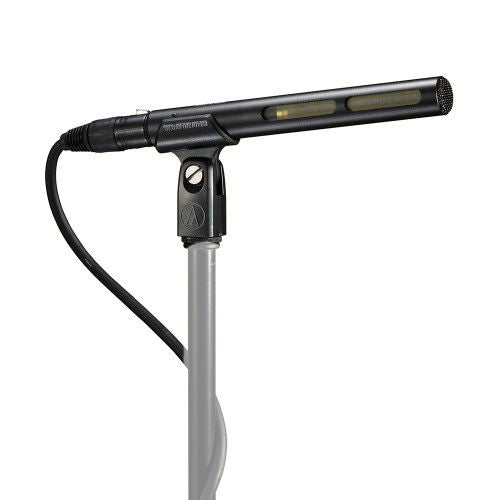 Shotgun microphone with shock mount and cable, angled view