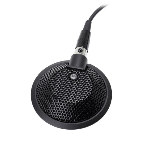 Omnidirectional conference microphone with circular mesh grille and attached cable