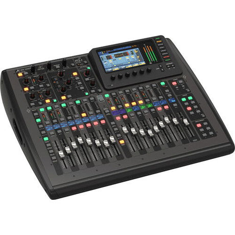 Behringer X32 compact digital audio mixer with color-lit controls and touchscreen display