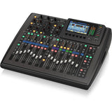 Compact digital mixer angled view with touchscreen, knobs, and rows of channel faders