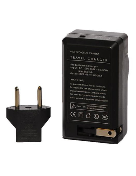 Back of black travel charger with two-pin plug and battery compartment