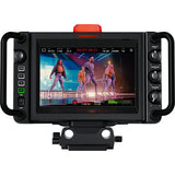 Studio camera with built-in screen showing a video timeline, red tally on top