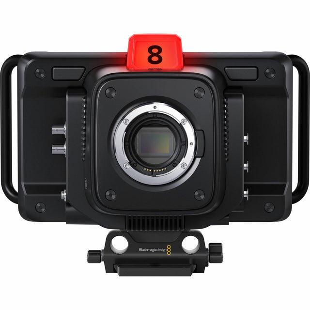 Black camera body with lens mount and red top marker marked 8