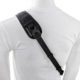 Black padded camera strap with attachment clip and webbing adjustment sliders