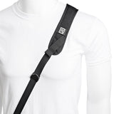 Black padded camera strap with logo patch on shoulder pad and fastening tab