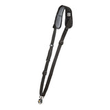 Black camera strap with padded shoulder section and adjustment buckles