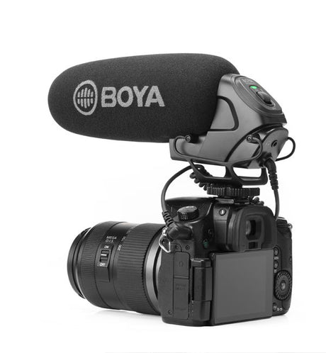 Shotgun condenser mic with foam windscreen mounted on camera