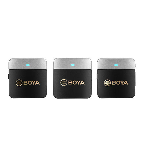 Dual-channel wireless lavalier mic units, black and silver with blue status light