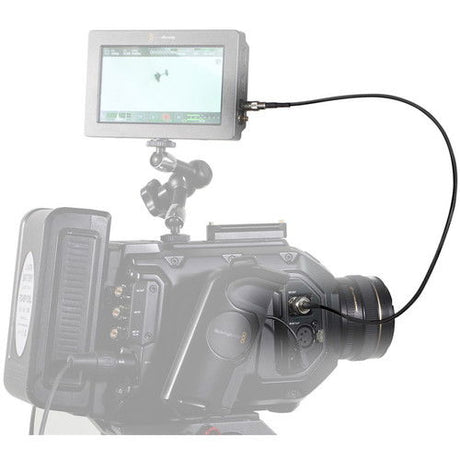 SDI cable plugged into video assist on camera rig, black cable