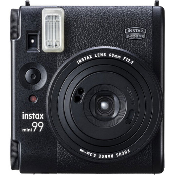 Black Instax instant camera, close-up of front lens and flash window