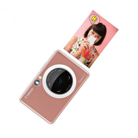 Zoemini S2 rose gold instant camera with sample photo card
