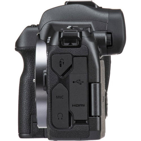 Black mirrorless camera body, ports panel with HDMI and MIC labels