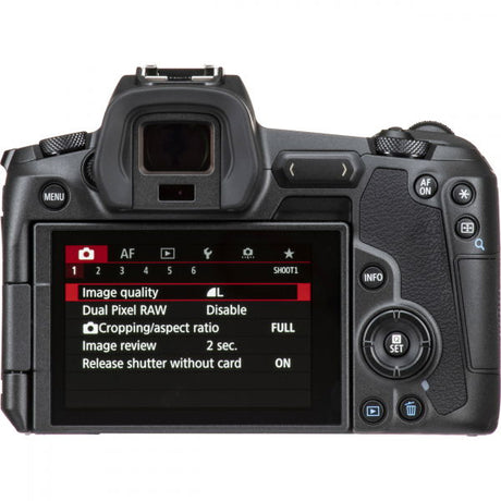 Black mirrorless camera body, rear view with LCD screen and buttons