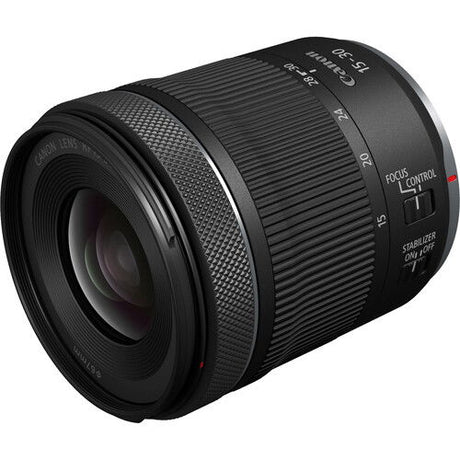 Black 15-30mm lens front with textured rubber ring and engraved focal scale