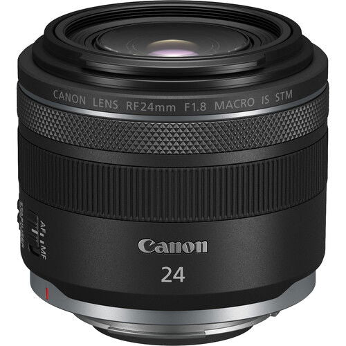 Canon RF 24mm f/1.8 macro lens front view, black finish, textured grip