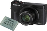 Digital camera with zoom lens and included extra rechargeable battery