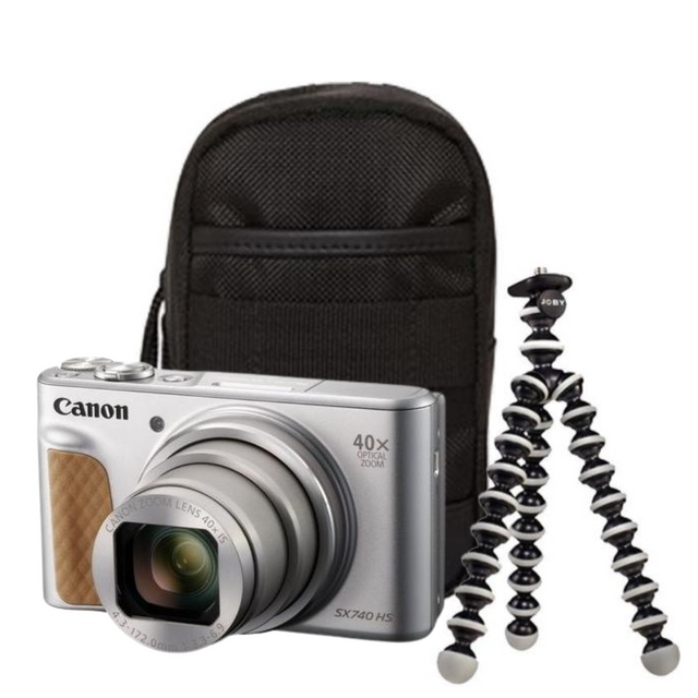 Silver compact camera with black case and small tabletop tripod