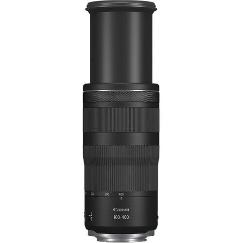 Black 100-400mm telephoto lens, angled front and barrel zoom/focus rings visible