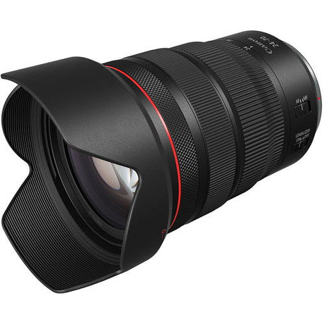 Angled view of black 24-70mm camera lens with front glass and red accent ring