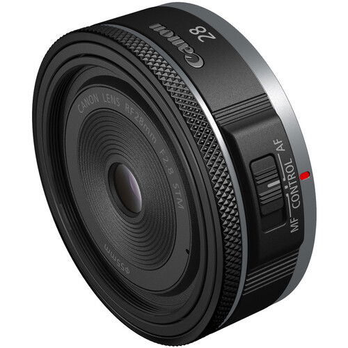 RF 28mm f/2.8 STM lens angled front, glass element with textured focus ring