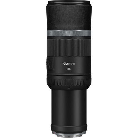 Tall black telephoto lens with silver ring detail and textured grip section
