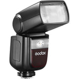 Black TTL speedlight with tilting flash head and front diffuser window