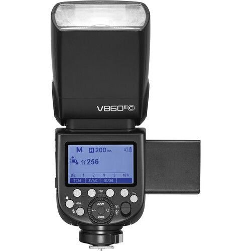 TTL flash with LCD screen, mode buttons, and open battery compartment door