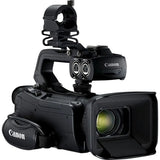 Canon XA50 camcorder side view with front lens and removable cable ports panel