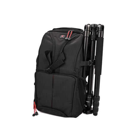 Andex 1 sling camera backpack with tripod attached, black with red-accent zippers
