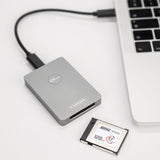 CFexpress Type B USB reader connected to laptop, with CFexpress card inserted