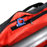 Close-up zipper on tripod bag cover, black outer with red lining and pull tab