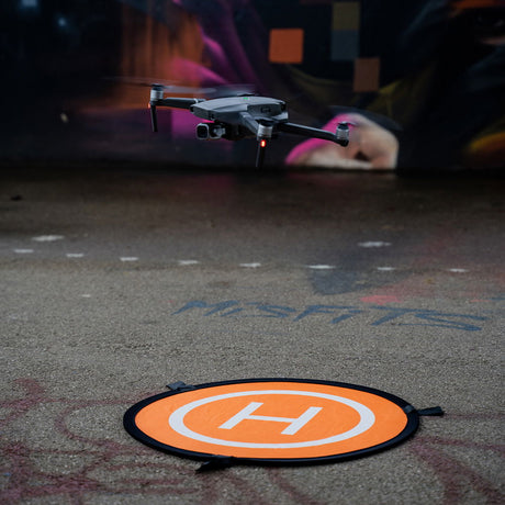 Caruba pad de aterizare dronă circular, portocaliu, simbol H alb