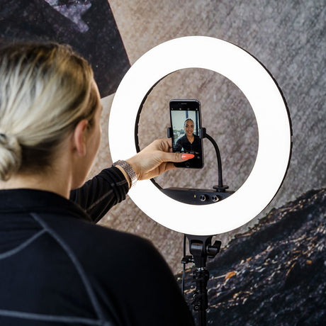 White LED ring light with adjustable phone clamp and viewing screen on stand