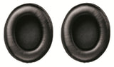 Pair of black cushioned ear pads for over-ear headphones