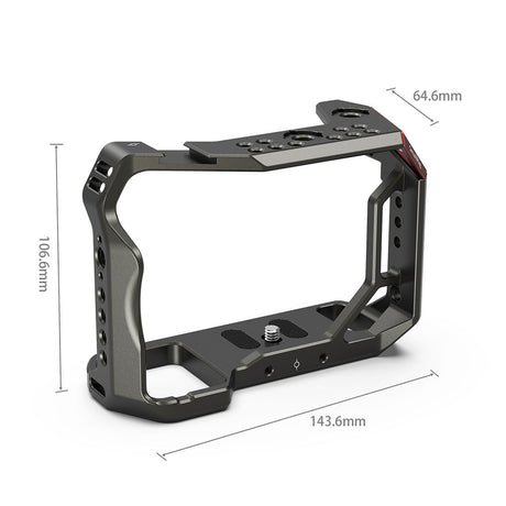 Sony A7 camera cage frame with mounting holes and base plate, side view, grey metal