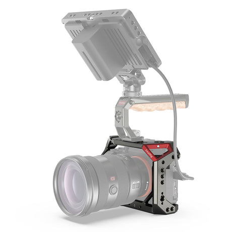 Sony A7 camera cage with top accessories and handle, mounted on camera with lens