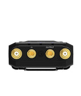 Black wireless UHF transmitter rear panel with gold OUTPUT ports and buttons