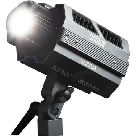 LED spotlight head with angled silver housing, vent slots, and tripod-style stand mount