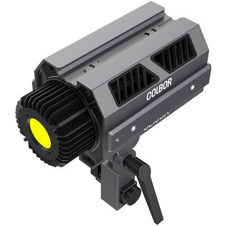 Angled view of black-and-gray LED spotlight with yellow lens, fan fins, and controls