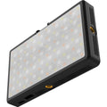 Portable black LED RGB light panel with side vent and circular lens detail