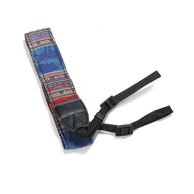 Multicolor woven camera strap with black padded ends and adjustable buckles