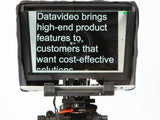 Teleprompter front view showing display panel behind adjustable hood and bracket