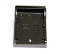 Black interchangeable power outlet module with two-pin contacts and mounting clips